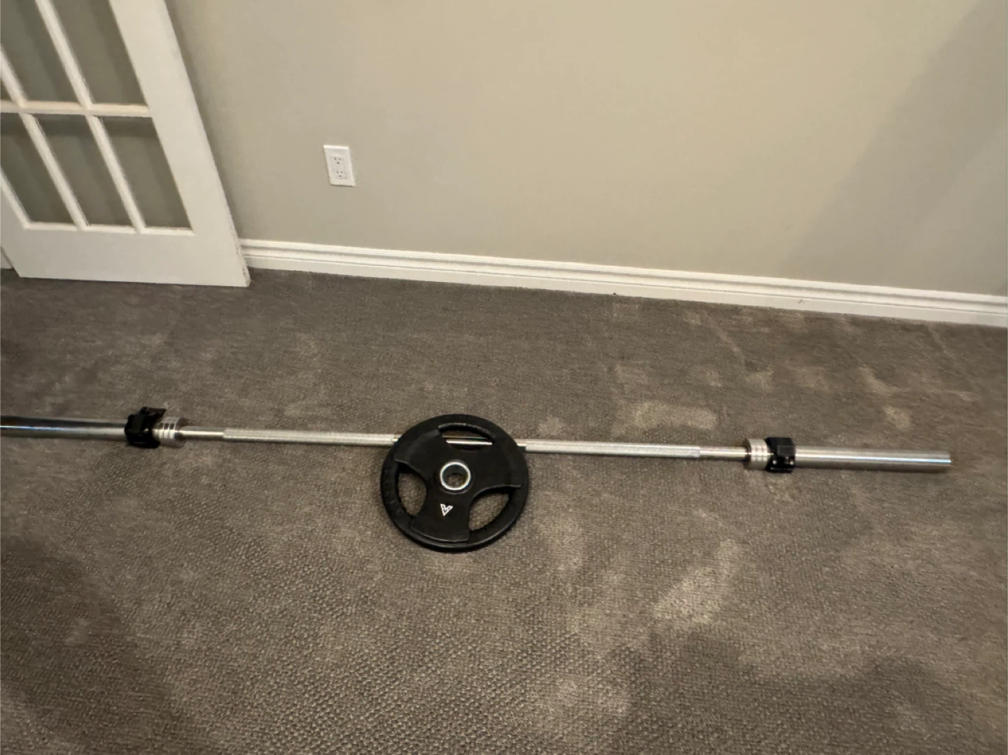 Olympian Style Barbell with 290 lbs of Weight Plates