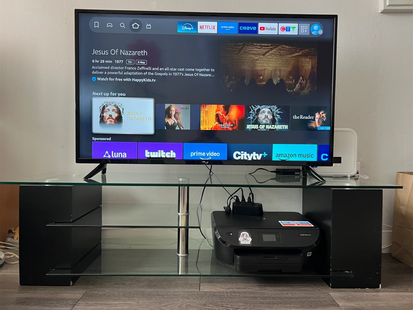 RCA TV 55”with Amazon Prime Stick and table