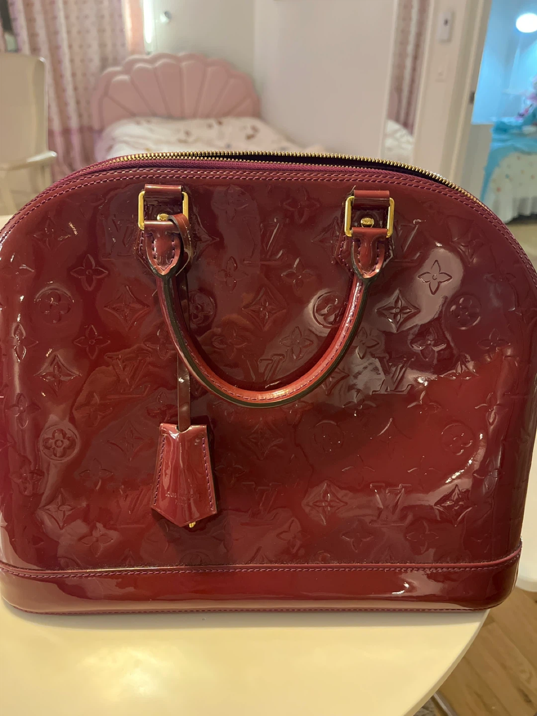 Louis Vuitton Alma Vernis Handbag