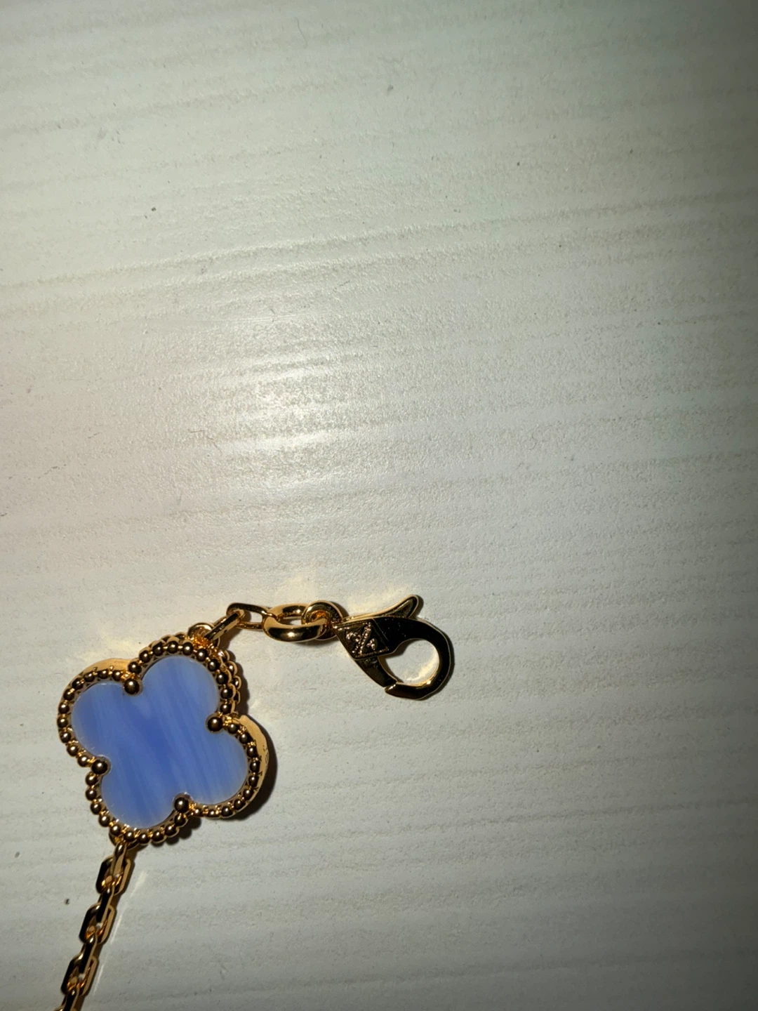 Gold-tone Bracelet with Blue Clover Charms - photo 2