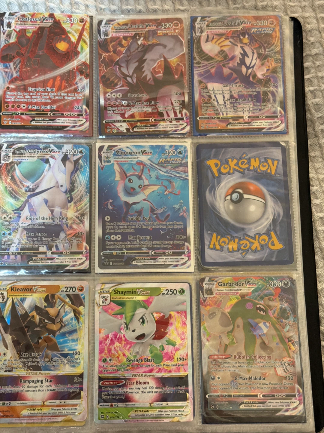 Assorted Pokemon Cards in Binder