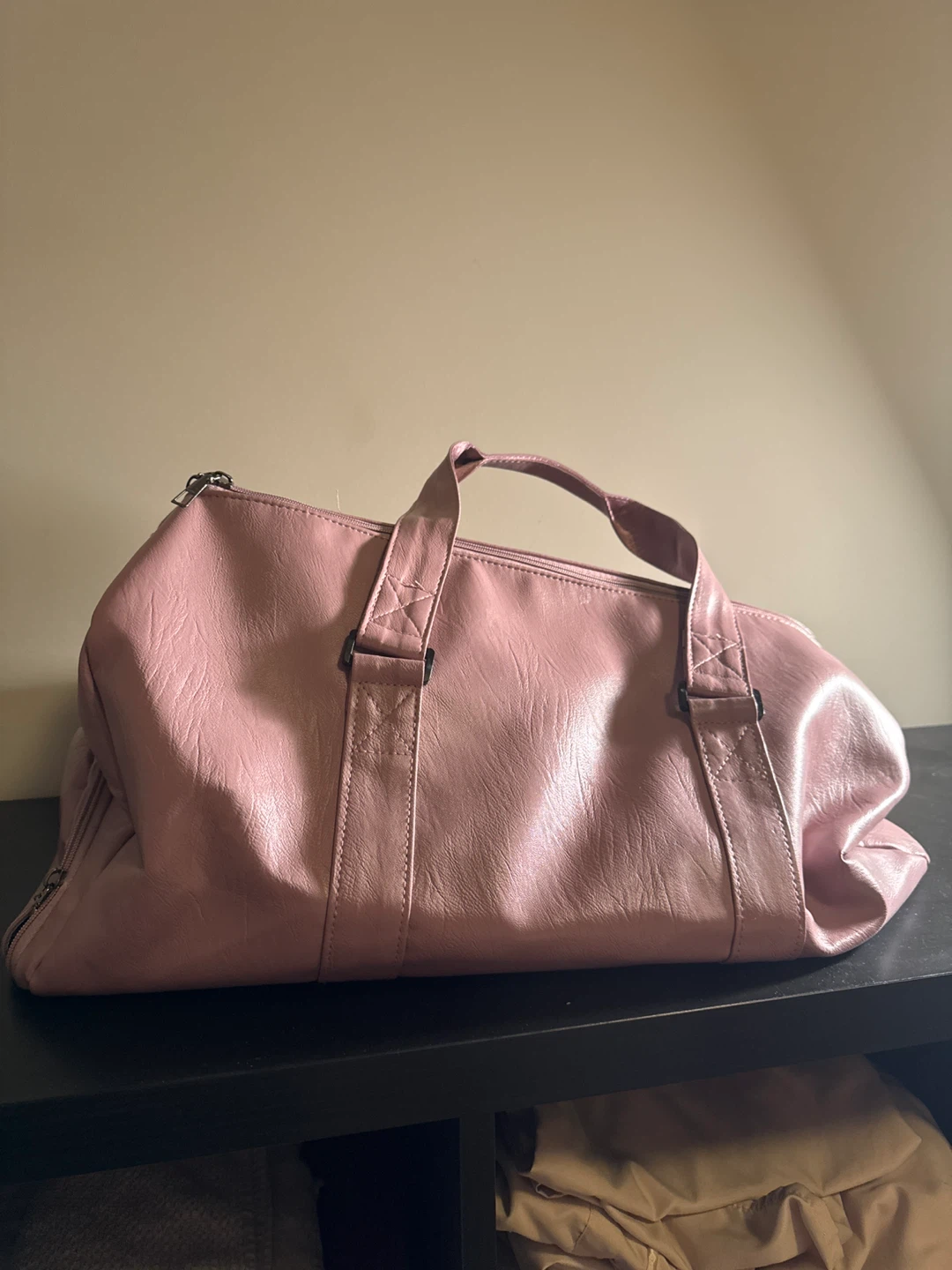 Pink duffel bag for traveling