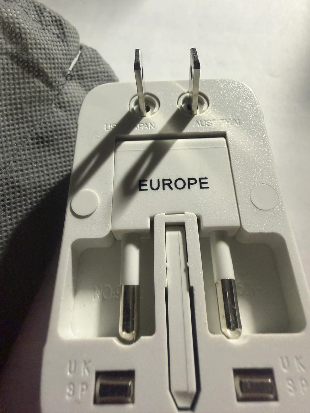 Universal Travel Adapter with Surge Protector - photo 4