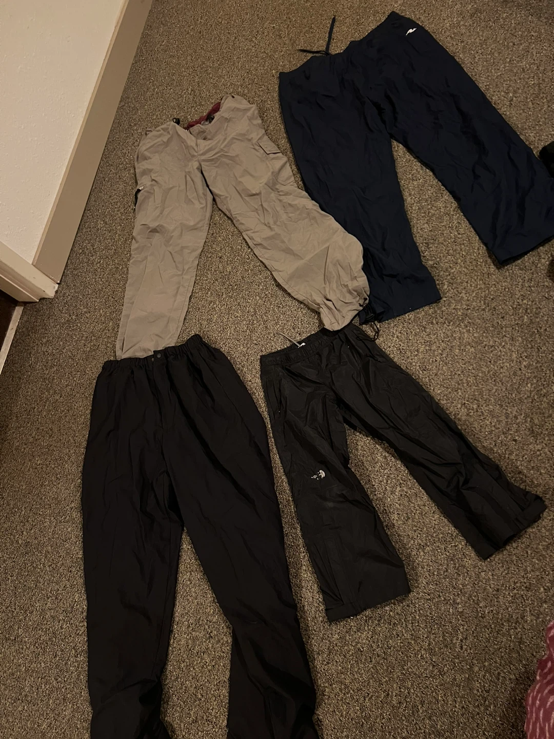 Verity of rain pants snow pants track pants and cargo pants