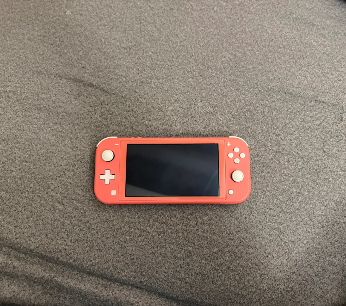 Nintendo Switch Lite Coral with Animal Crossing Case