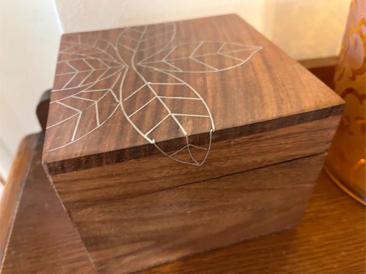 Wooden decorative box with leaf inlay