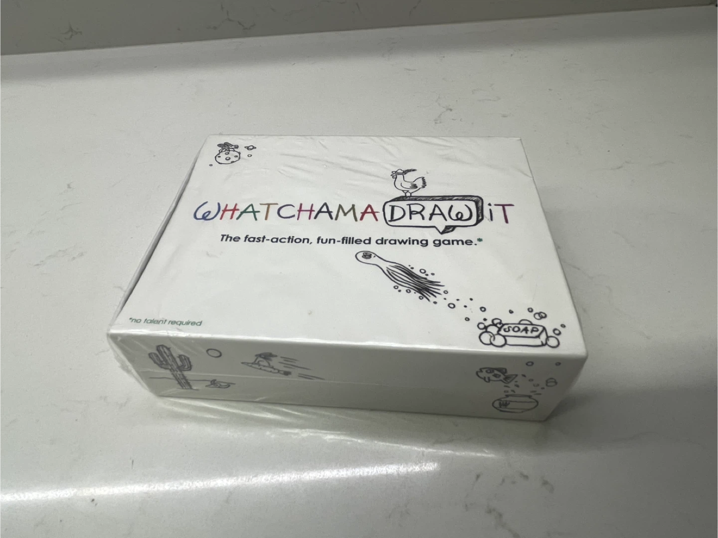 Whatchama DRAW it! The fast-action, fun-filled drawing game