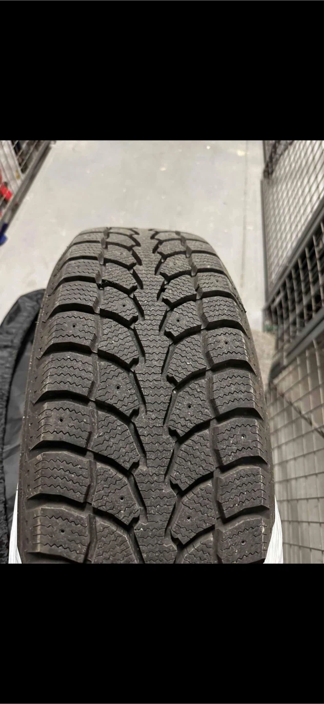 Winter tires including black steel wheels 225/65R17