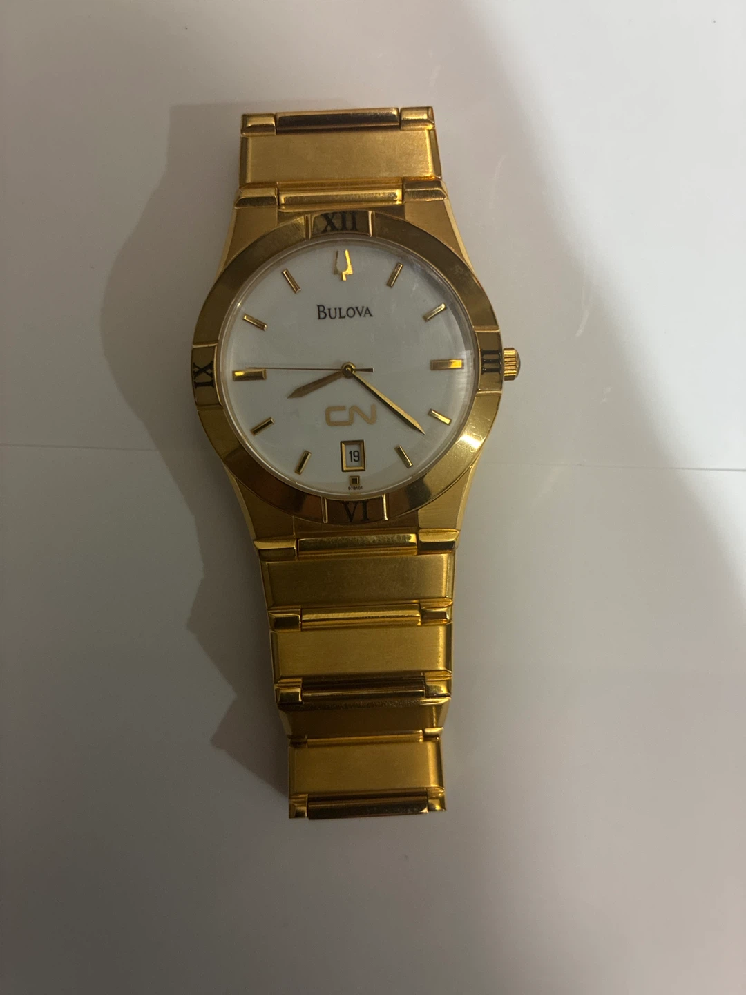 Bulova Gold-Tone Watch with CN Logo