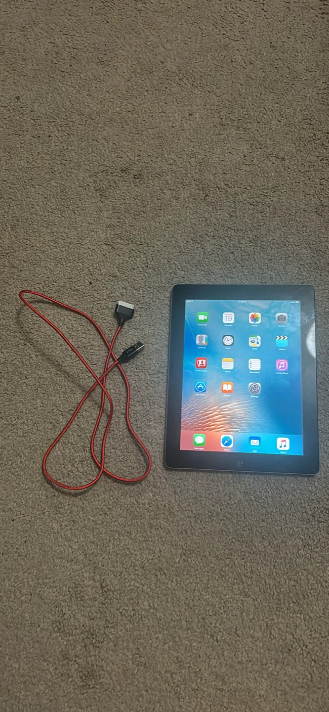 Apple iPad (3rd Gen) with Red Charging Cable
