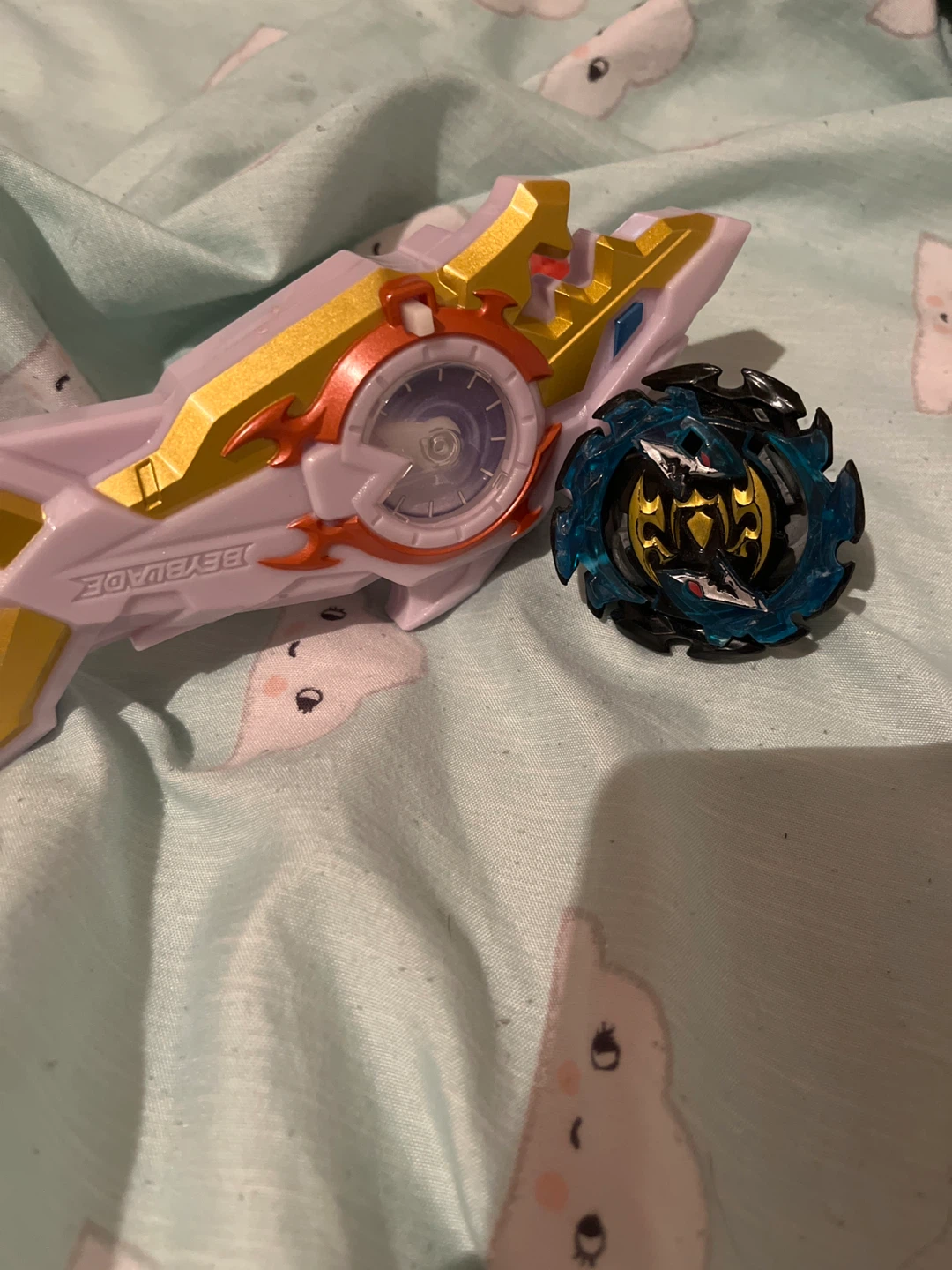 Beyblade Burst Launcher and Beyblade