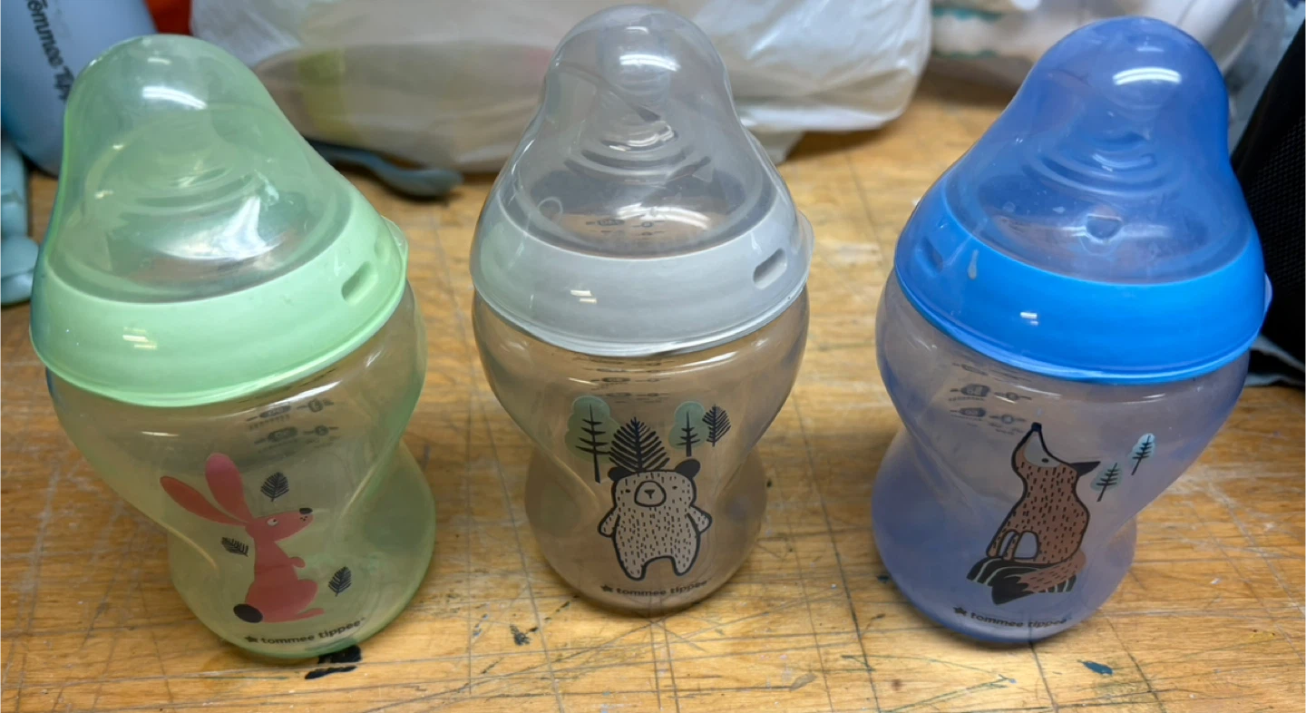 Assortment of baby bottles, plate, spoons, cactus toy - photo 5