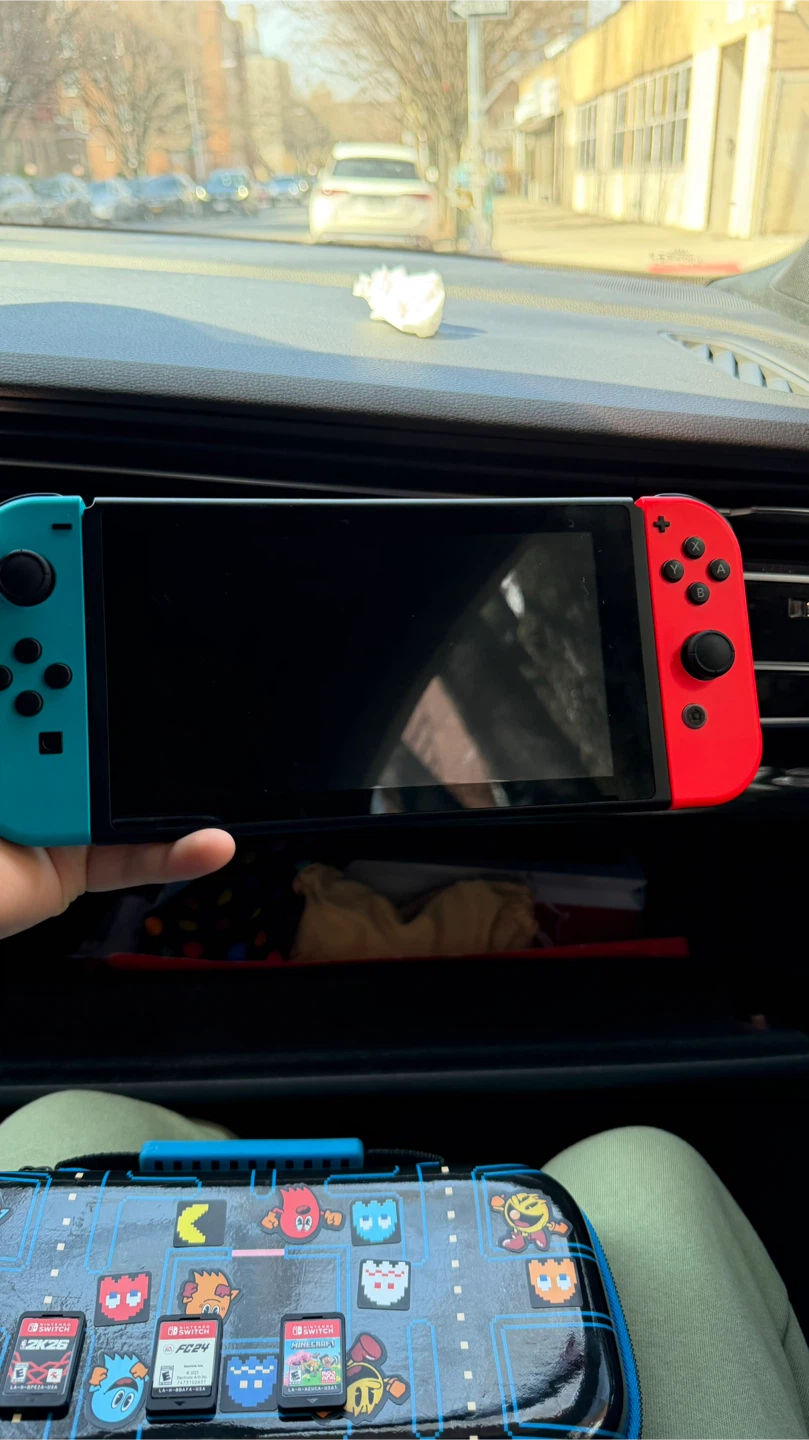 Nintendo Switch Console with Games and Case - photo 2