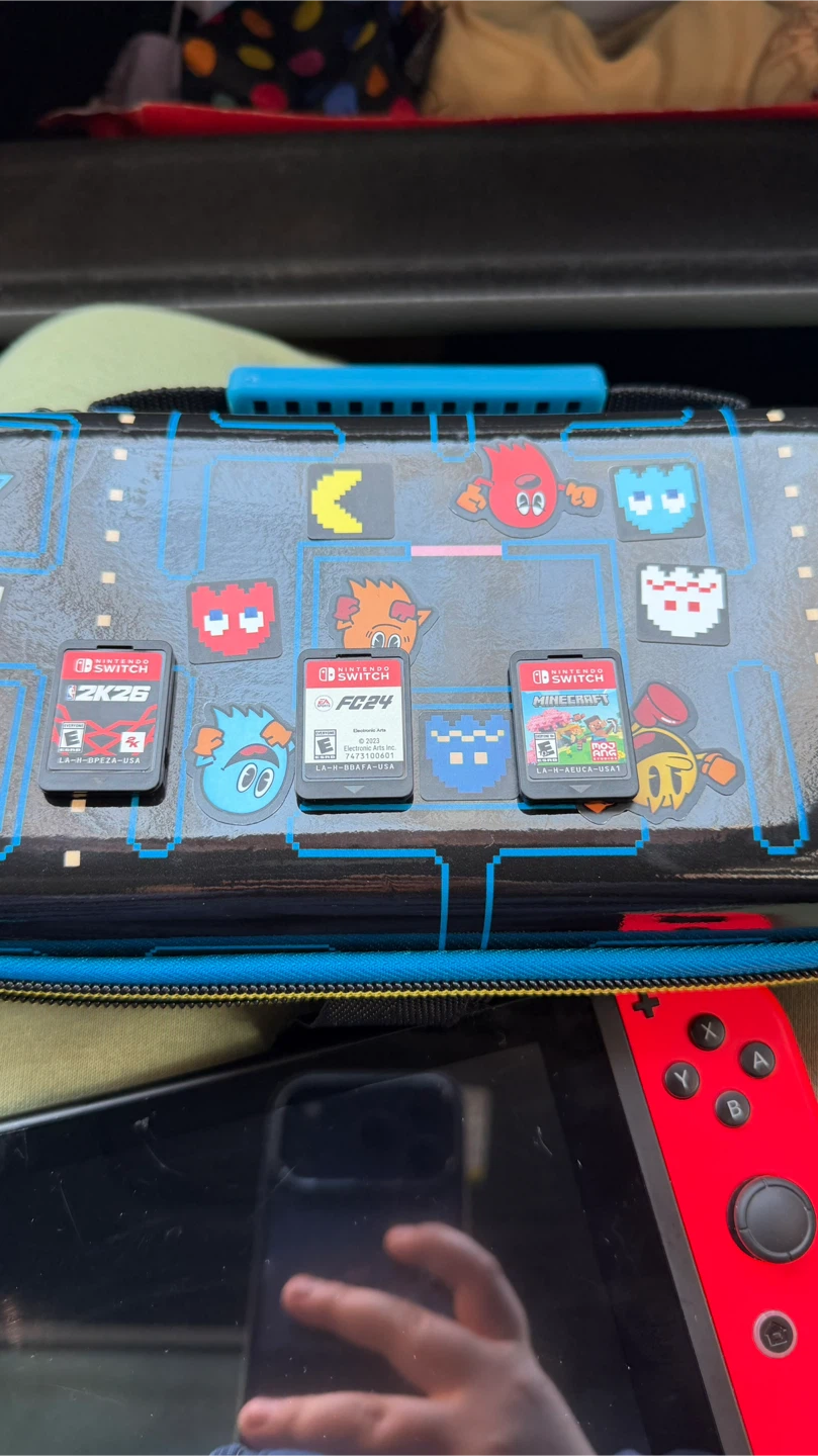 Nintendo Switch Console with Games and Case