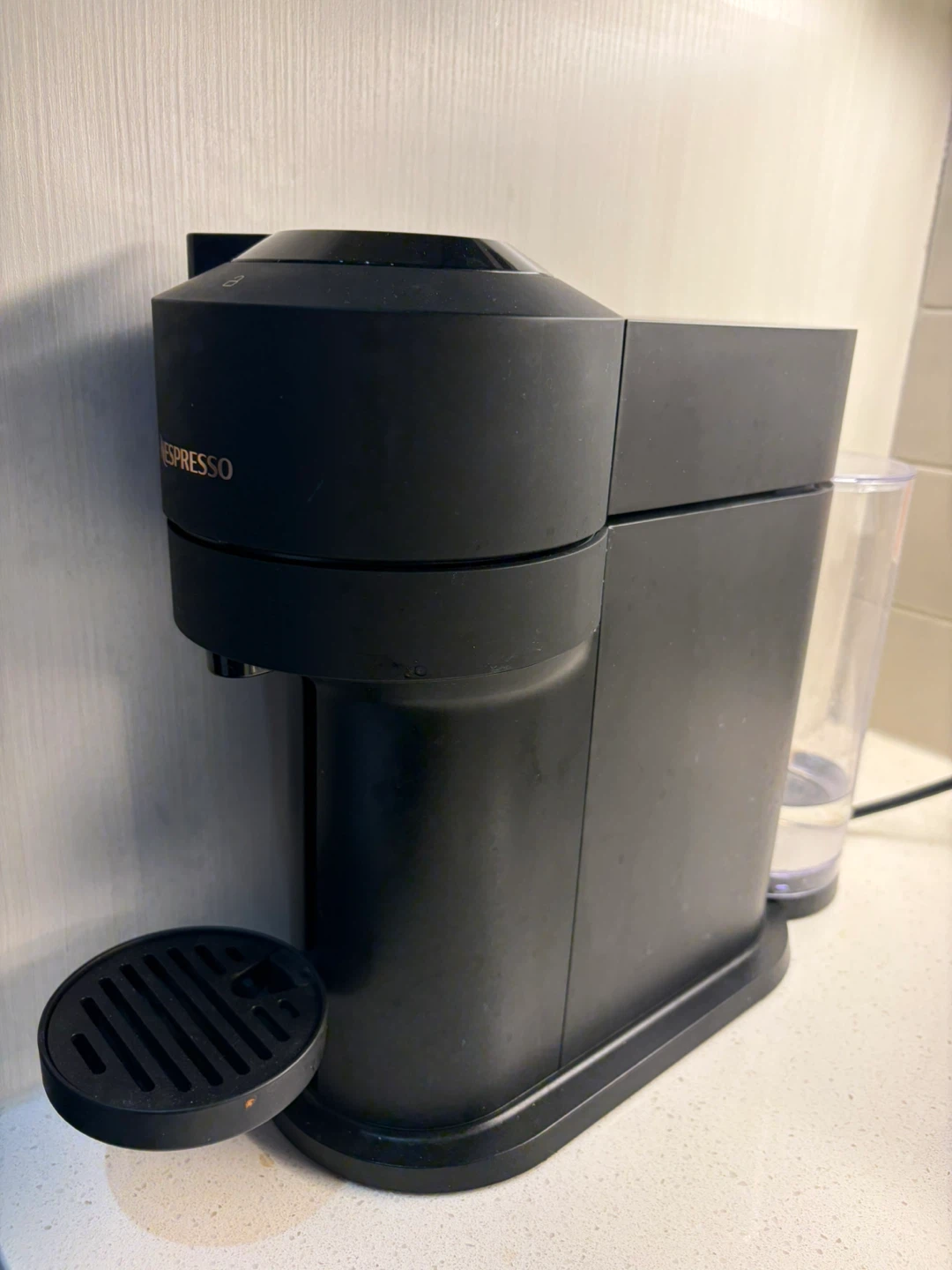 Nespresso Vertuo Next + left capsules