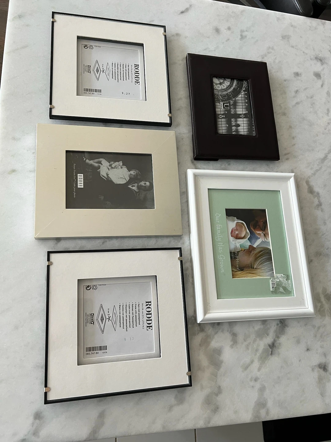 Assorted Photo Frames: IKEA, Umbra, and White Family Frame
