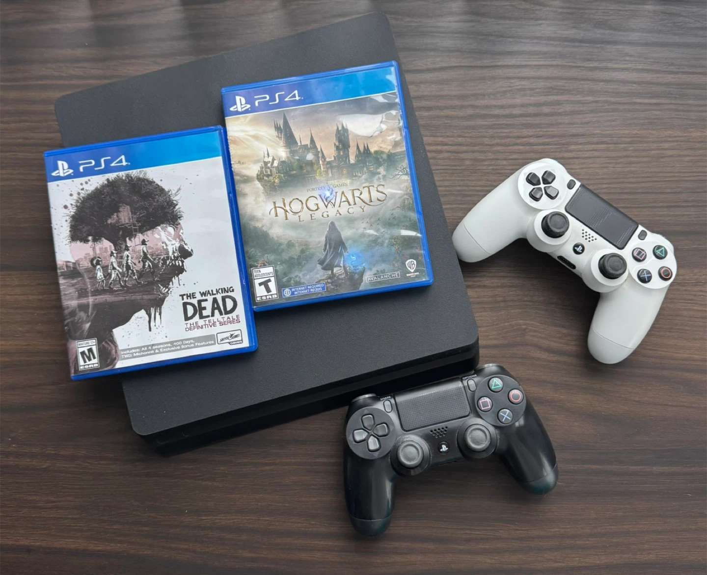 PS4 with two controllers and two games