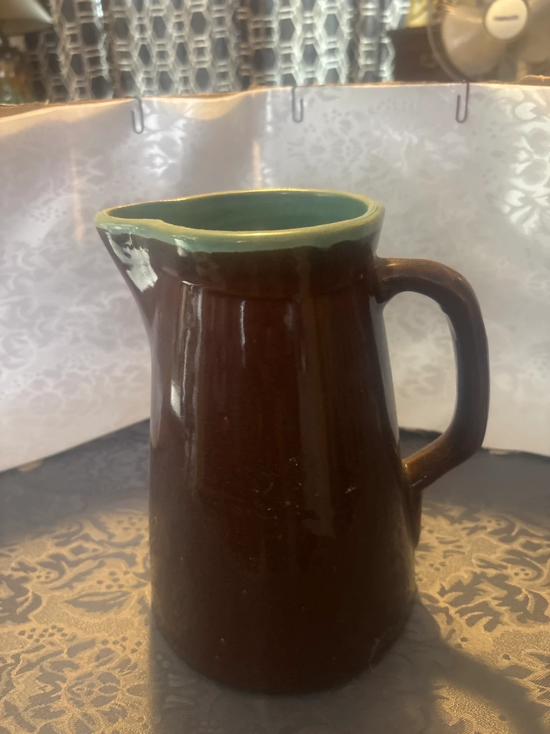 Brown Ceramic Pitcher with Green Rim