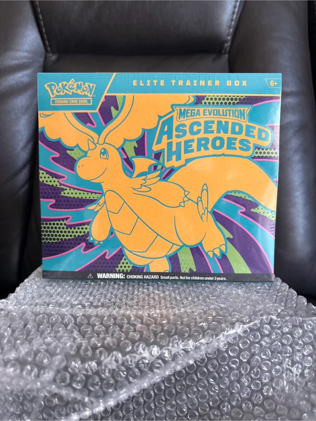 Ascended Heroes ETB WITH Acrylic Case. small tear on corner.