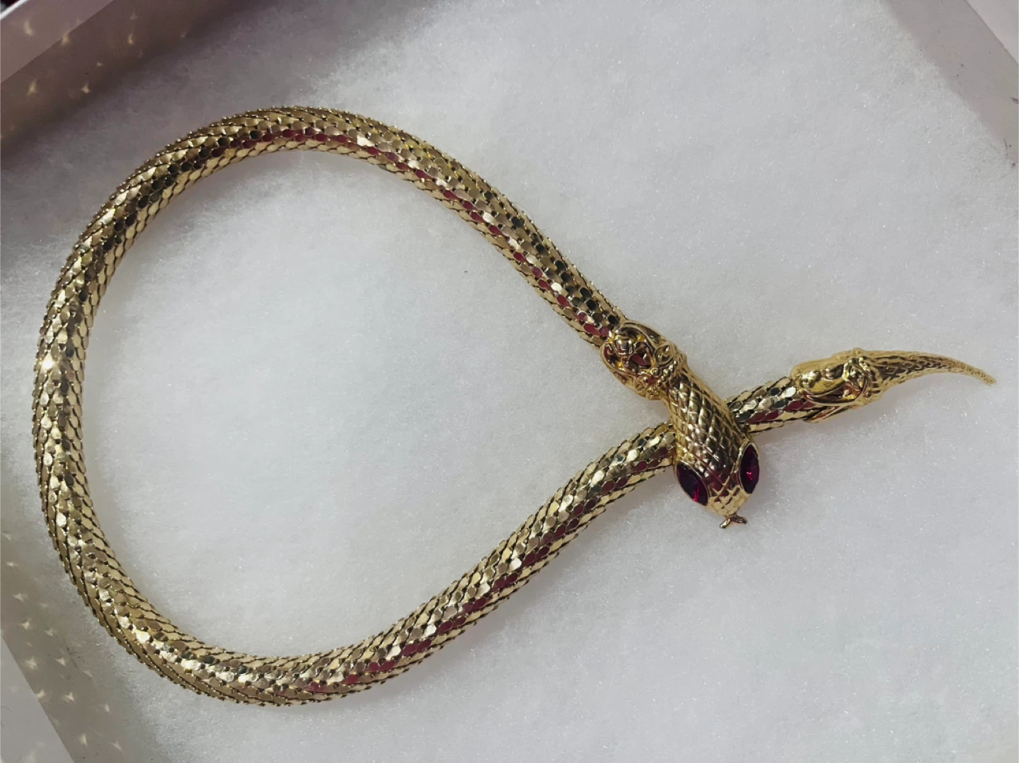 Gold Tone Snake Necklace with Red Gemstone Eyes