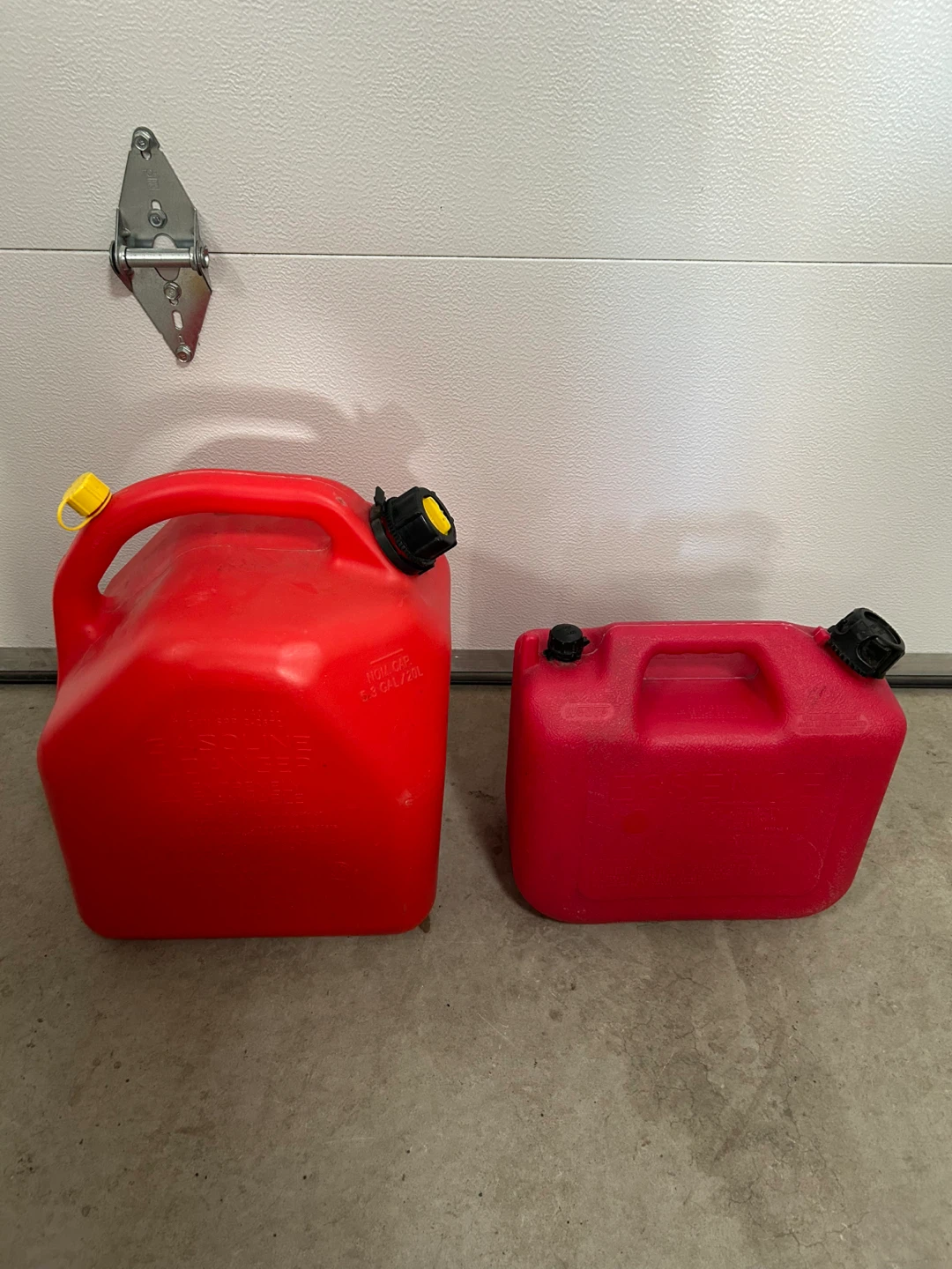 2  red gas/jerry cans