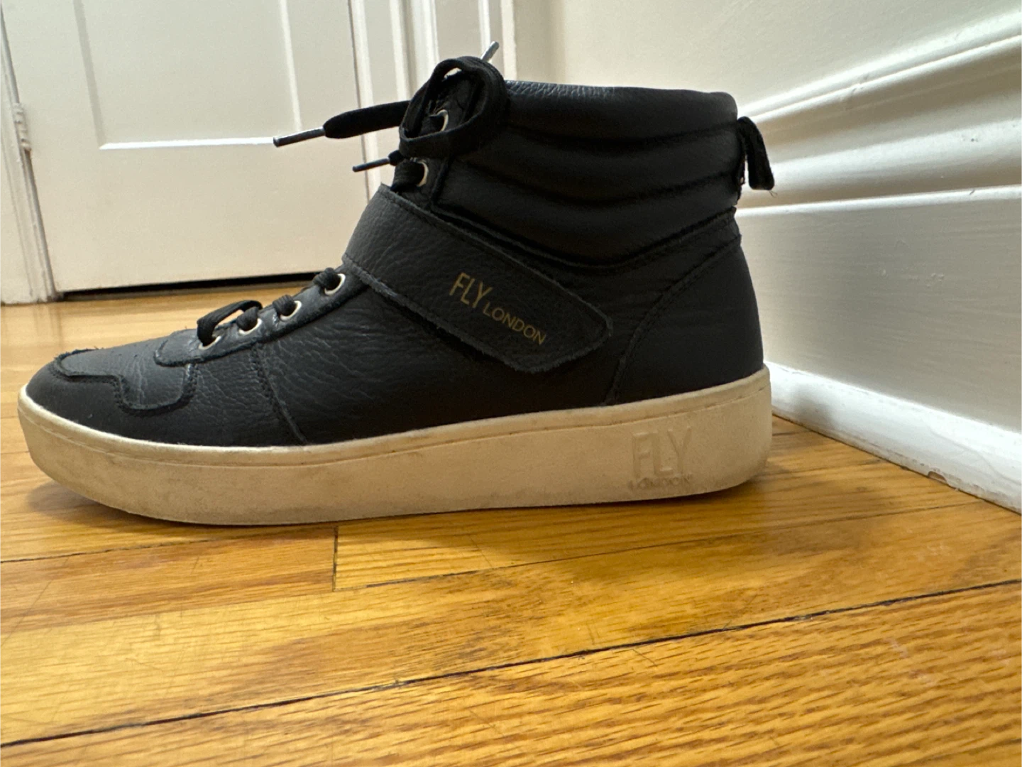 FLY LONDON Black Leather High Top Sneakers