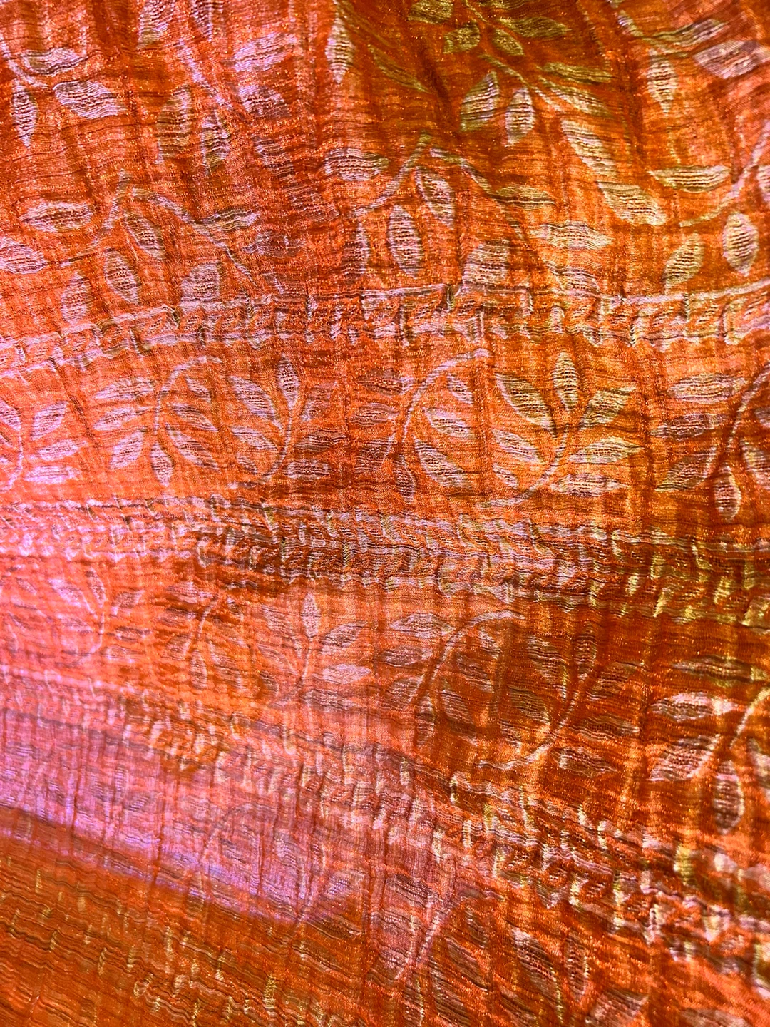 Orange Fabric Bolt with Floral Pattern