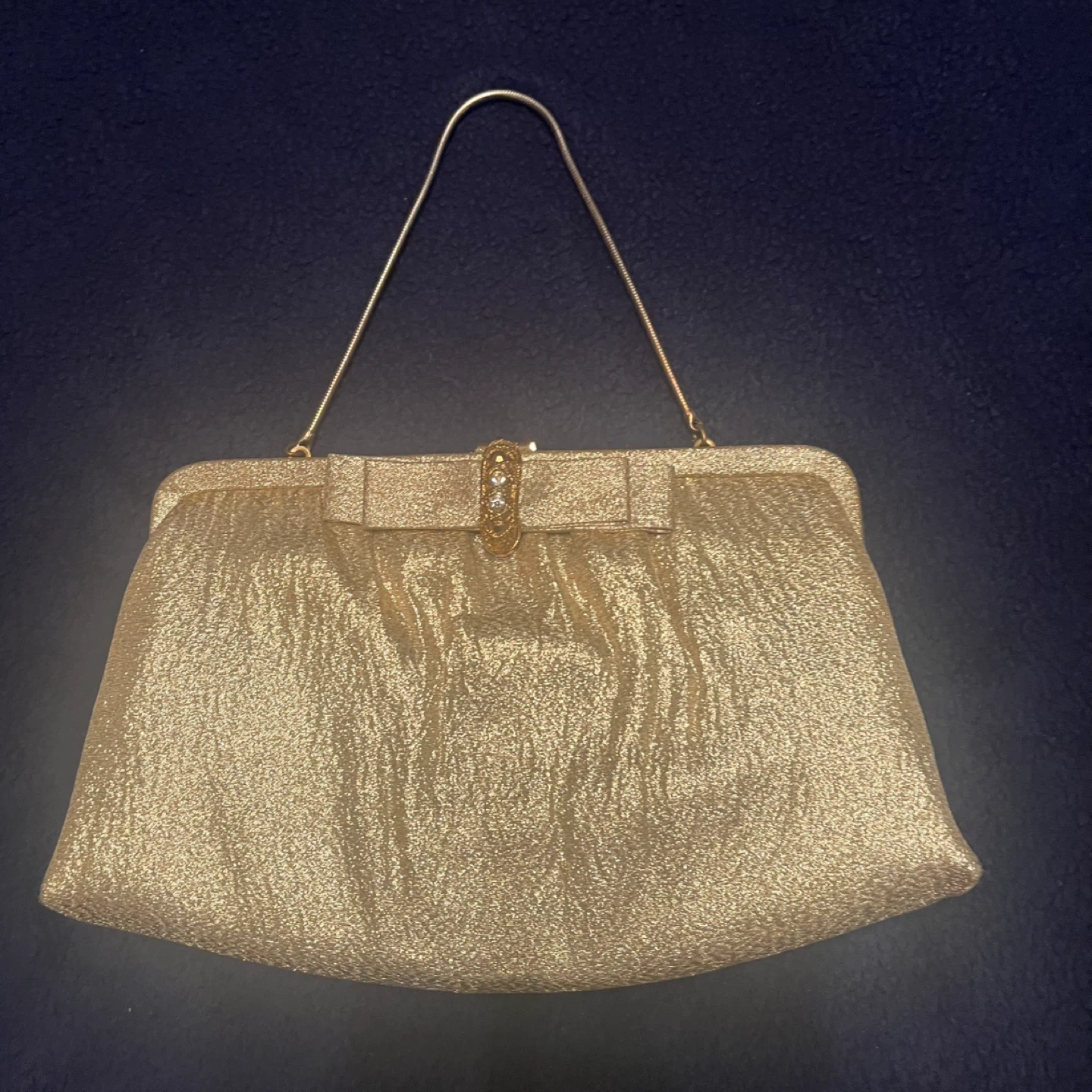 Gold evening purse with chain