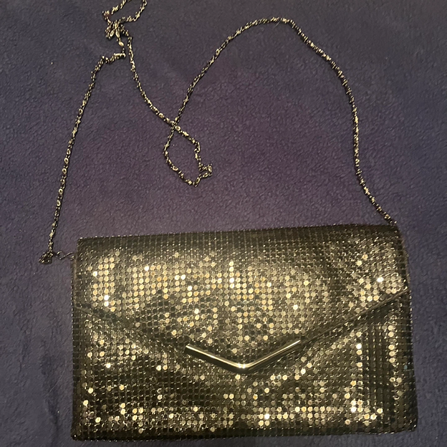 Gunmetal sequence clutch style purse, with chain
