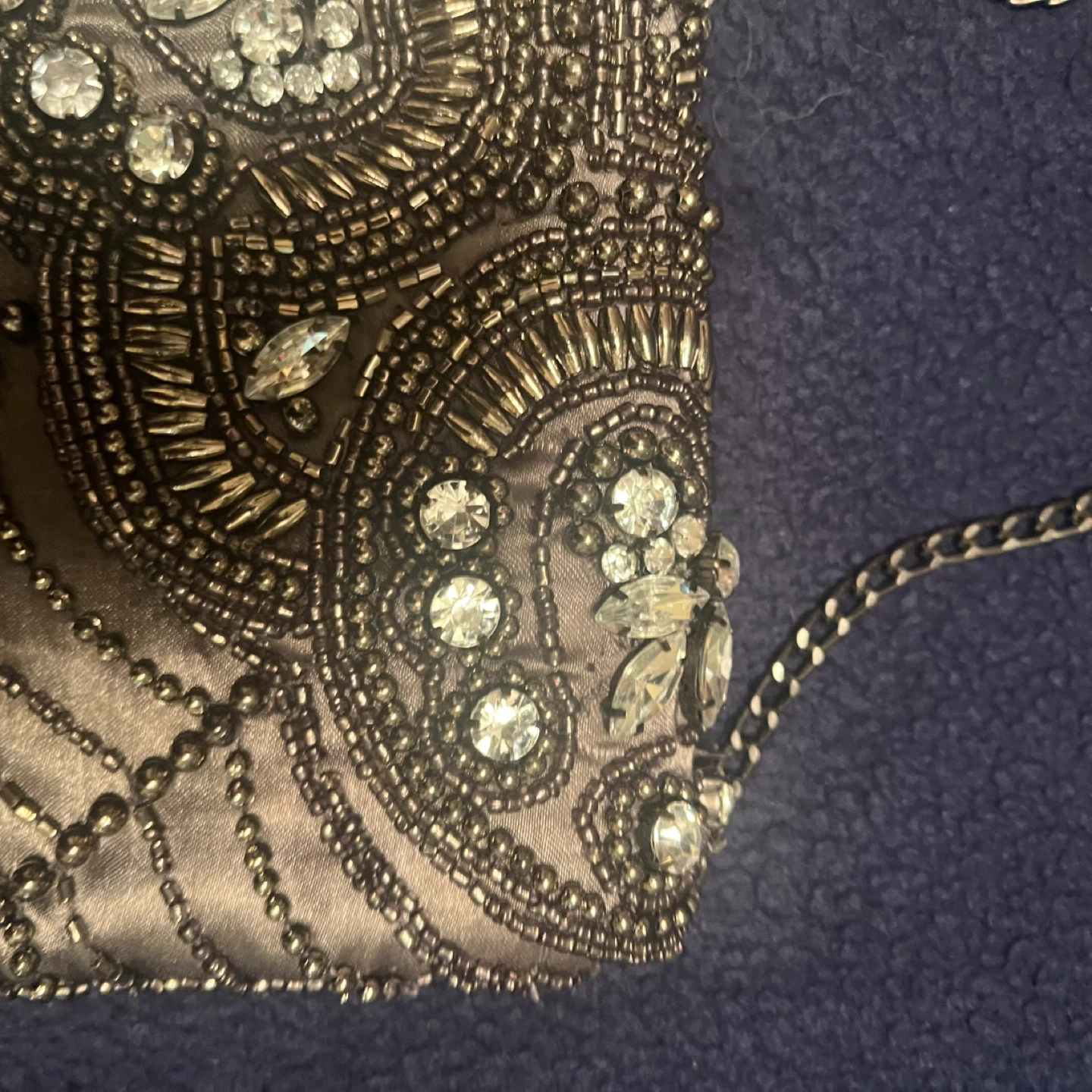 Silver clutch style purse with white stones on the front - photo 4