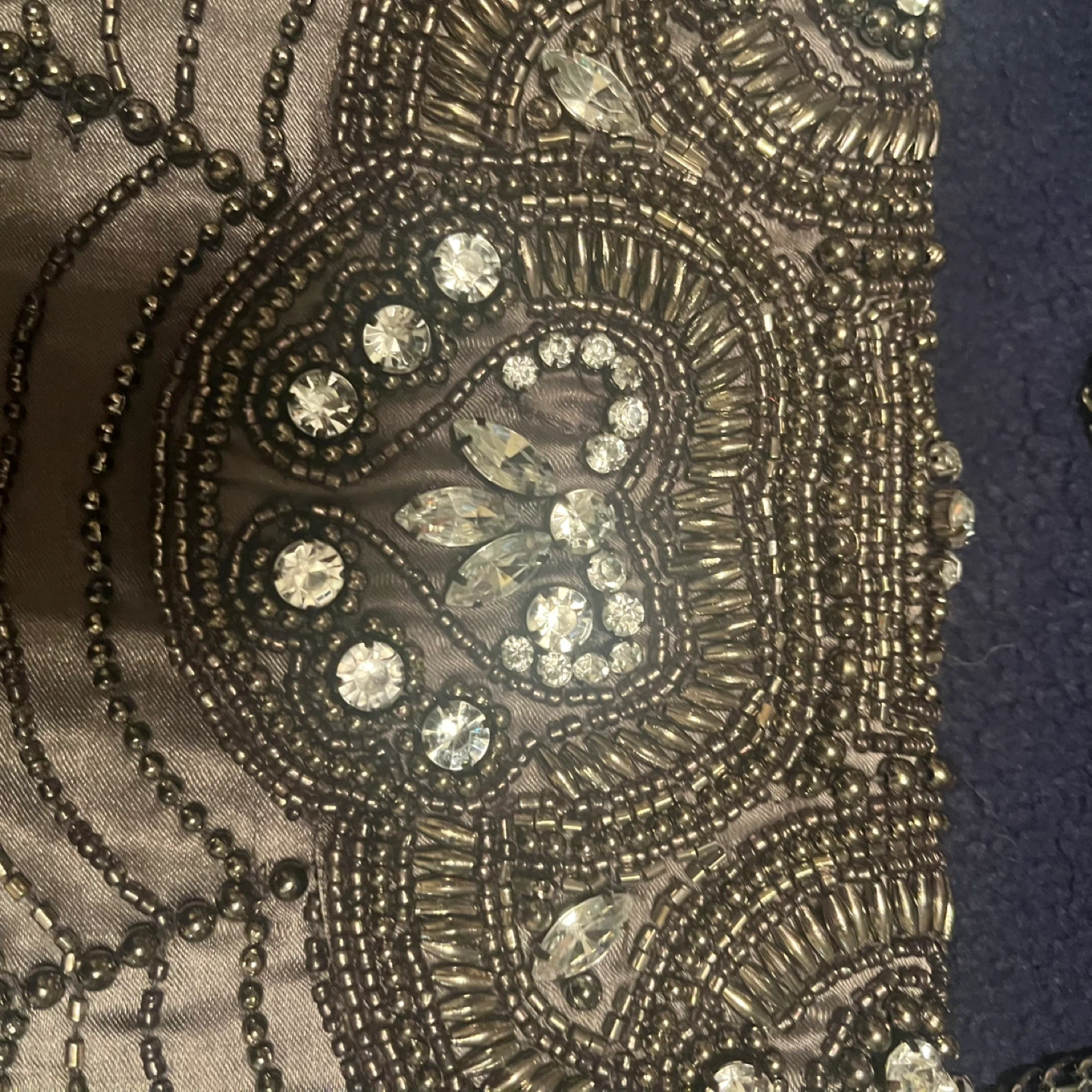 Silver clutch style purse with white stones on the front - photo 3