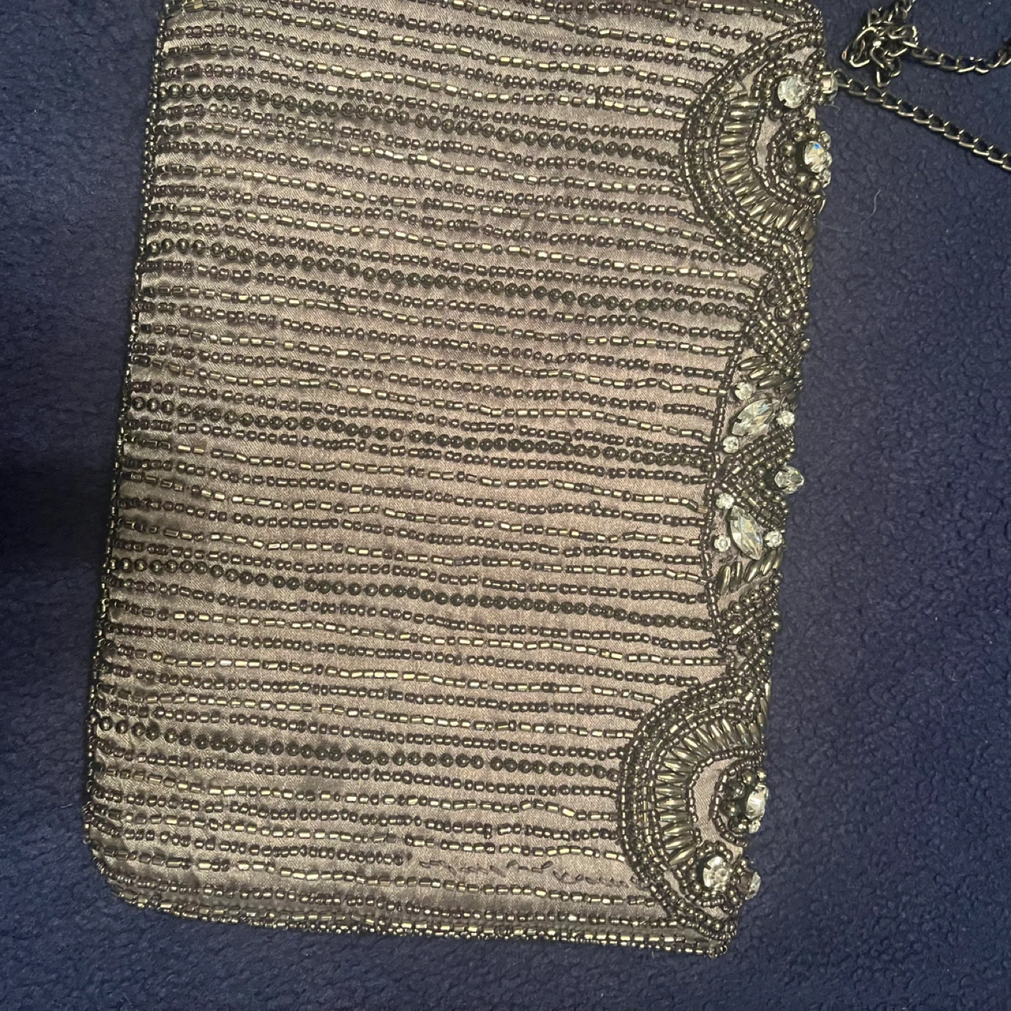 Silver clutch style purse with white stones on the front - photo 5