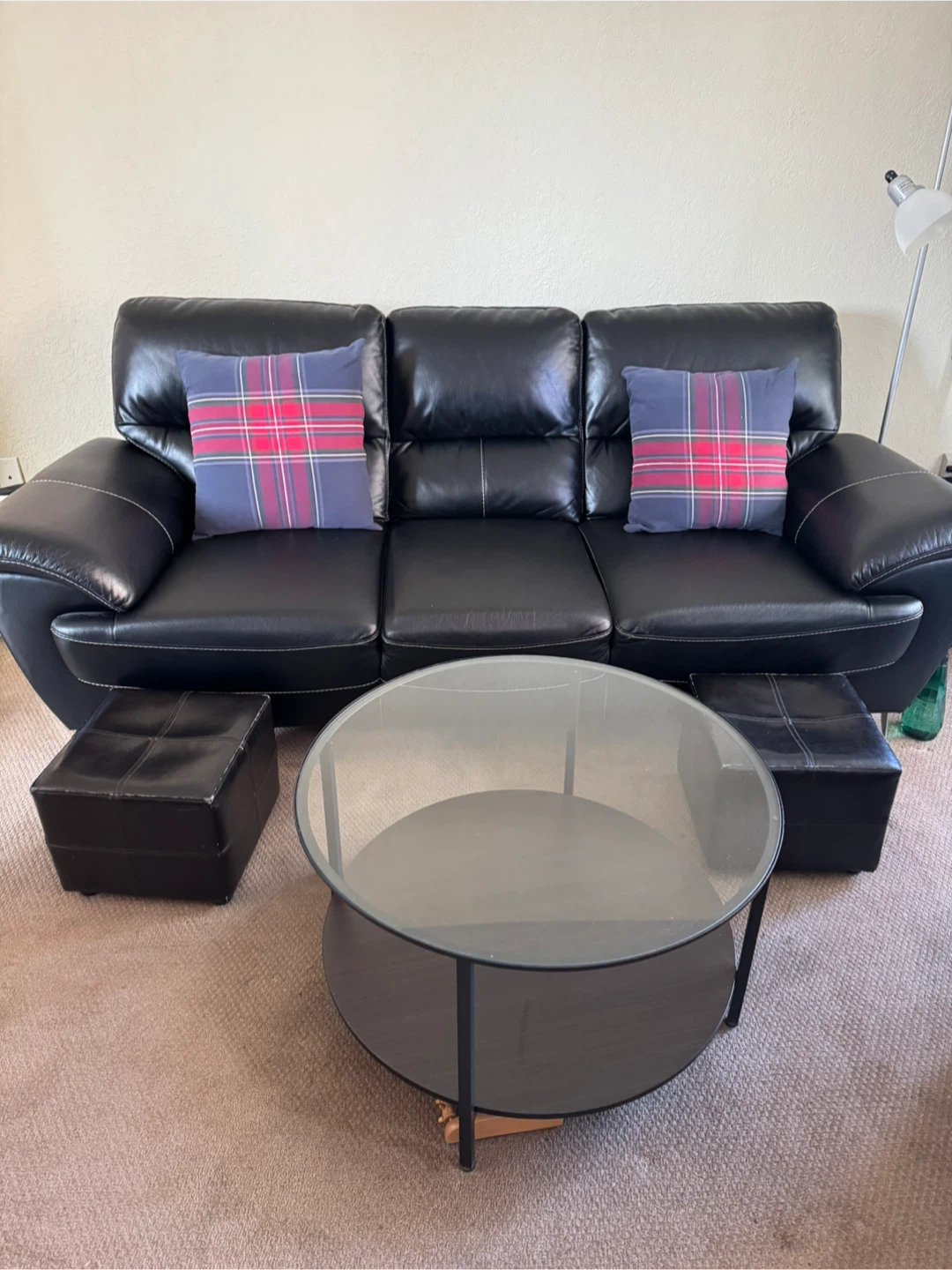 Black Leather Sofa with Coffee Table and Ottomans