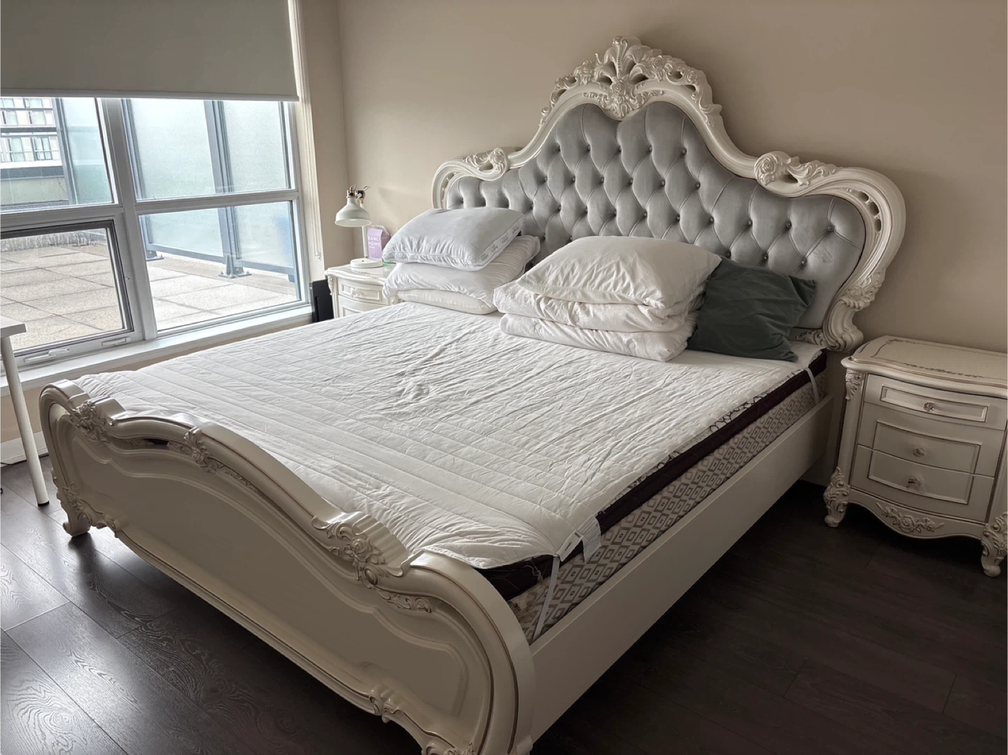 King size bed with two night stands.