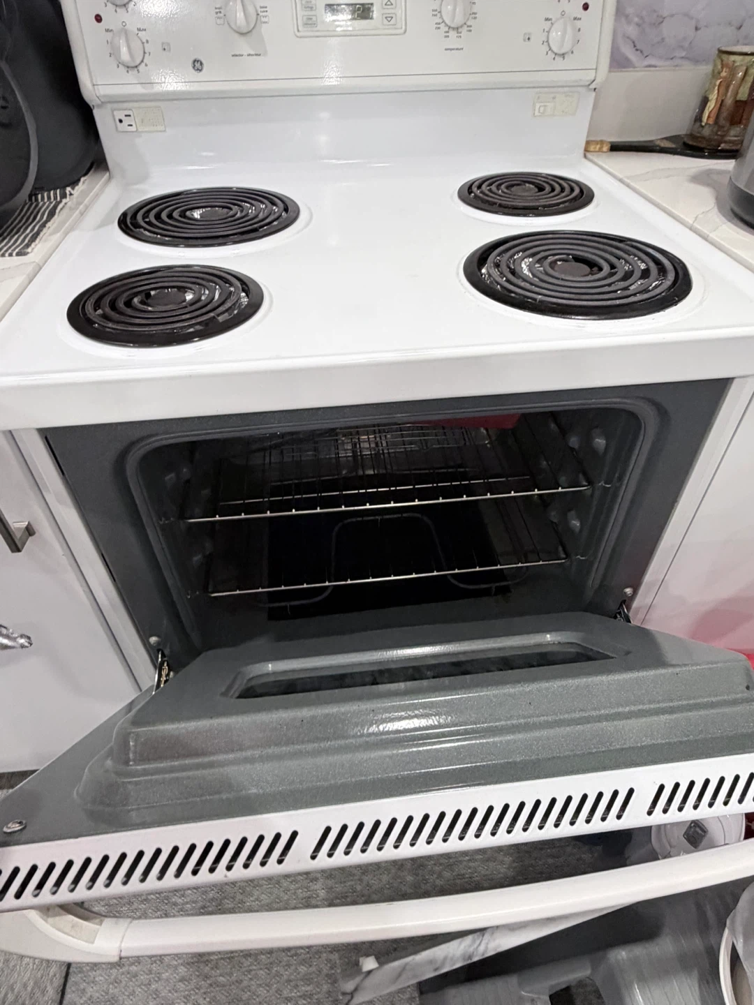GE White Electric Coil Top Stove and Oven