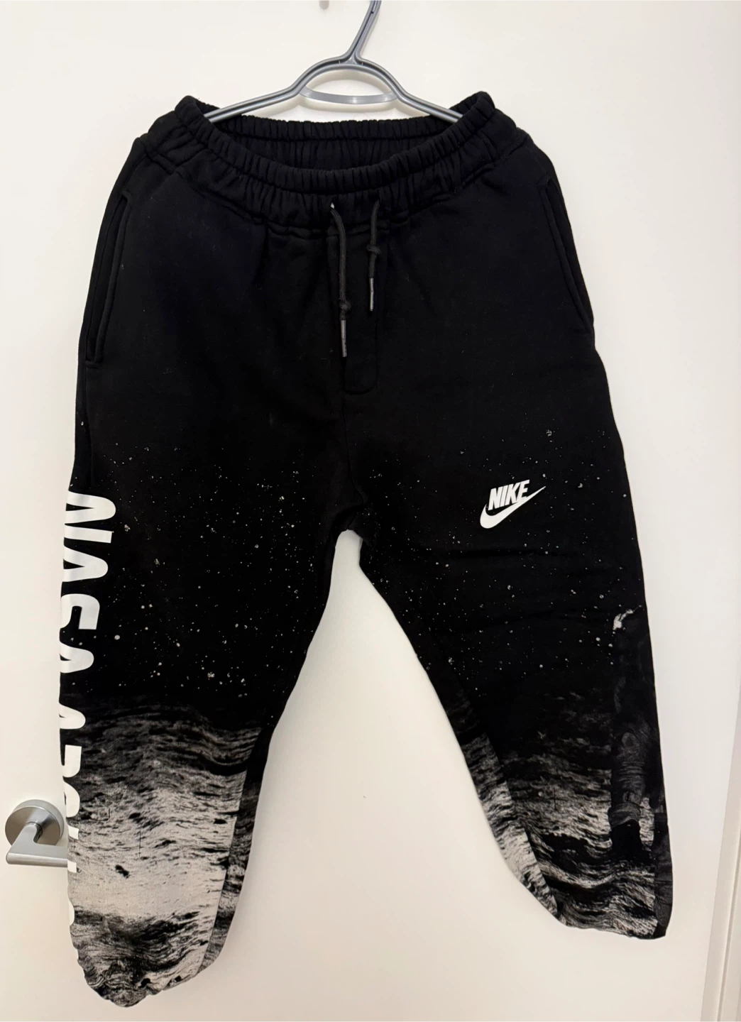 Nike black graphic sweatpants with space / astronaut design