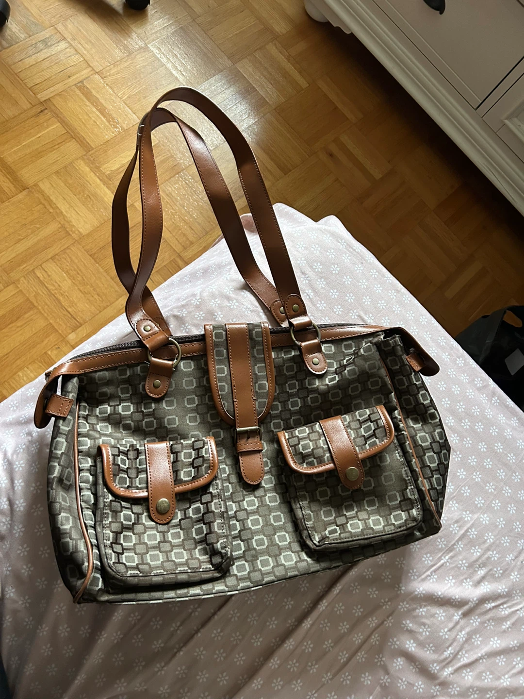 Brown patterned bag with brown leather accents