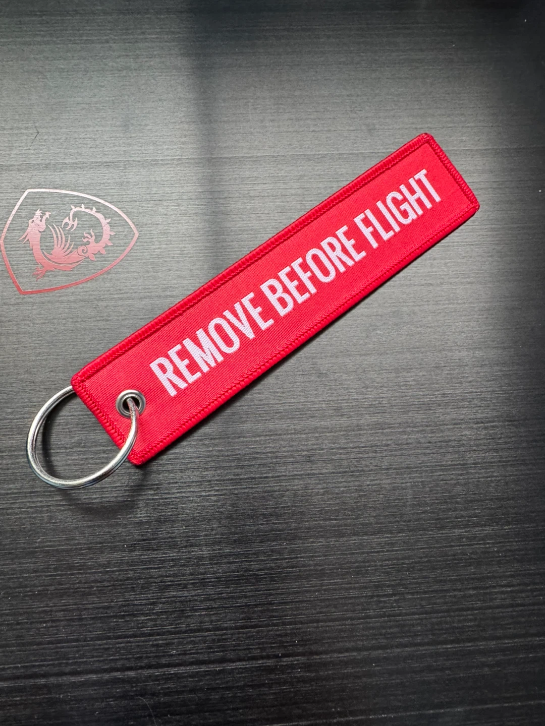 Remove before flight keychain