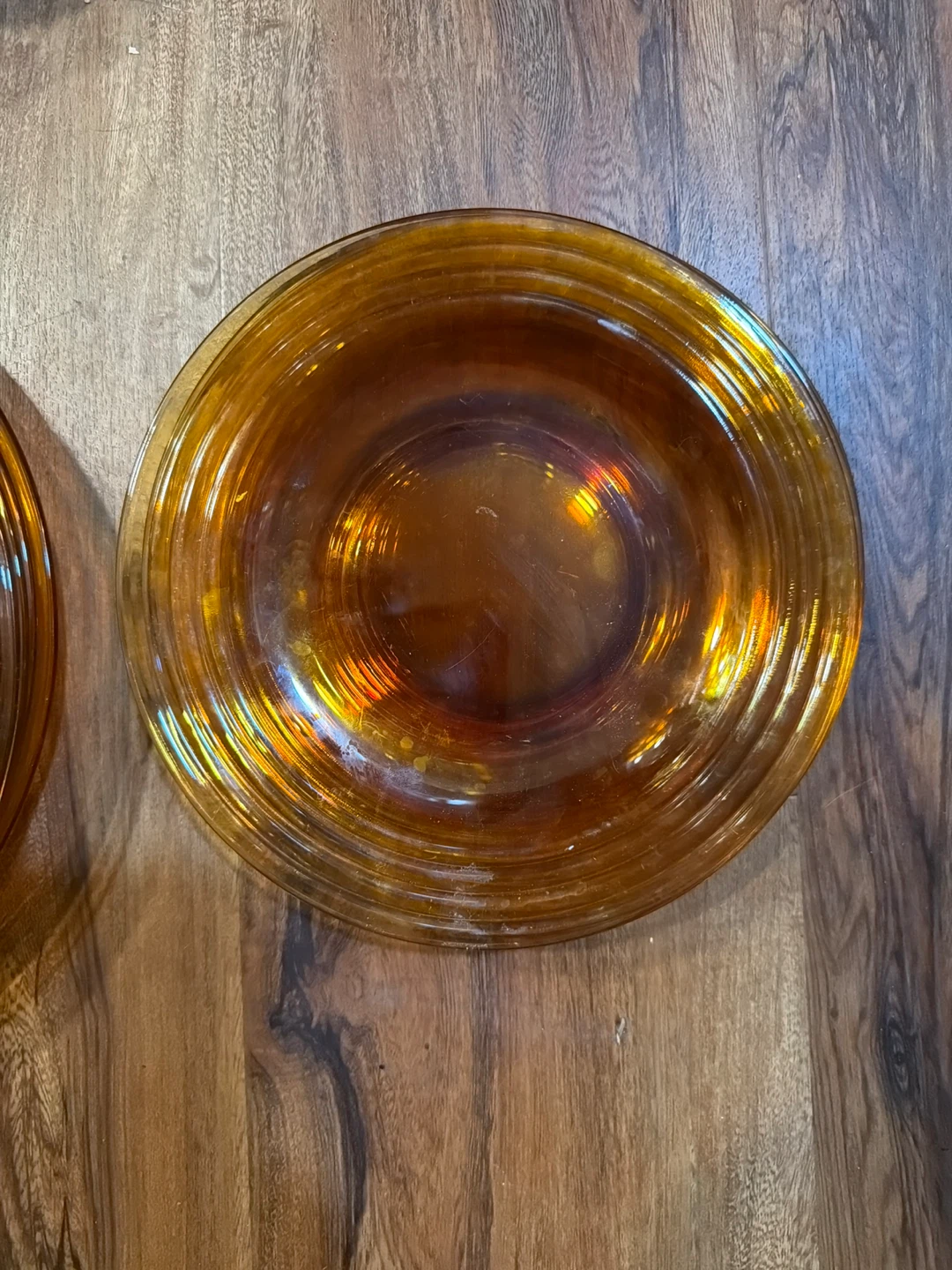 4 Amber Glass plates and 4 dessert place
