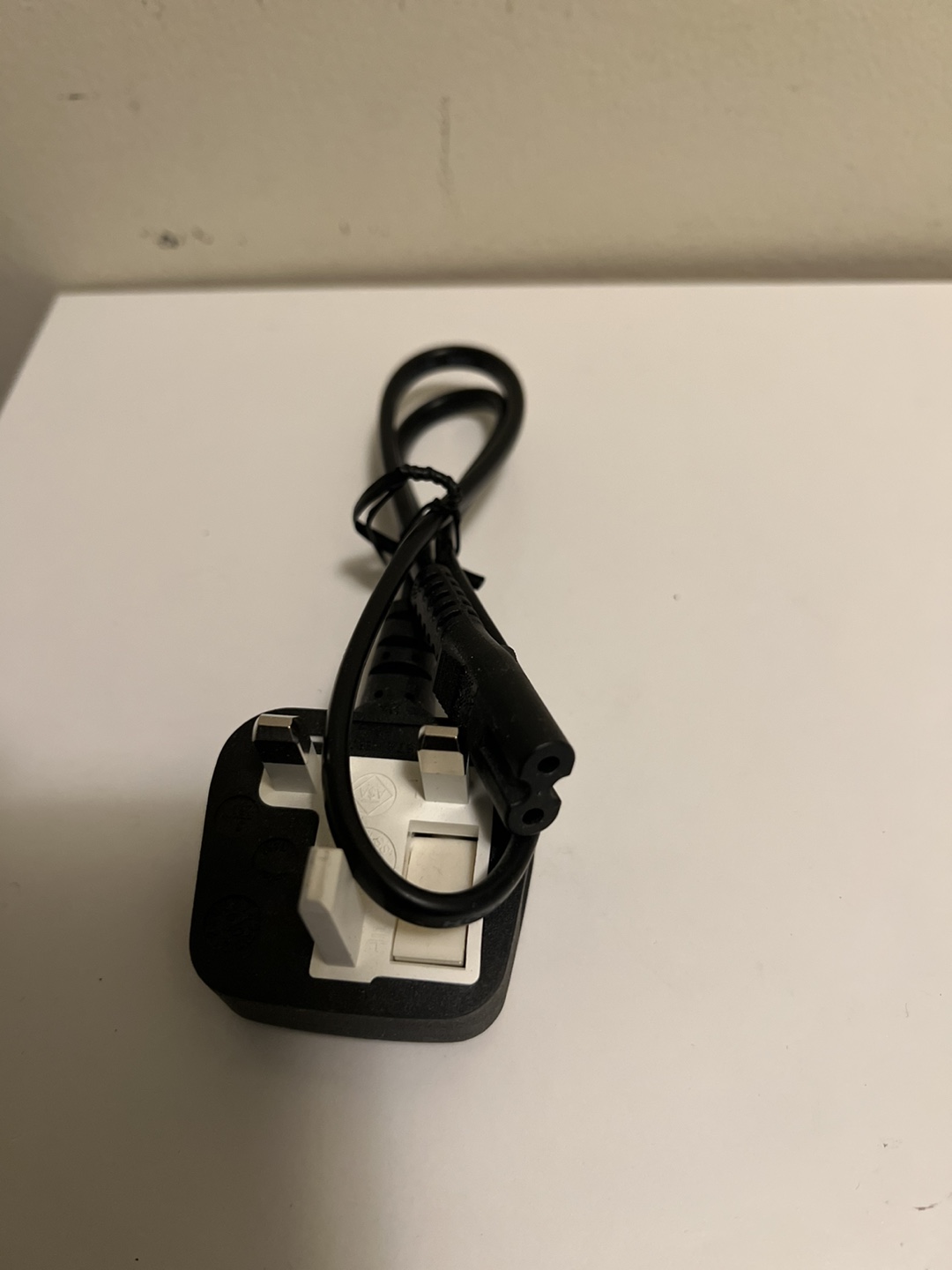 Power cord with UK plug