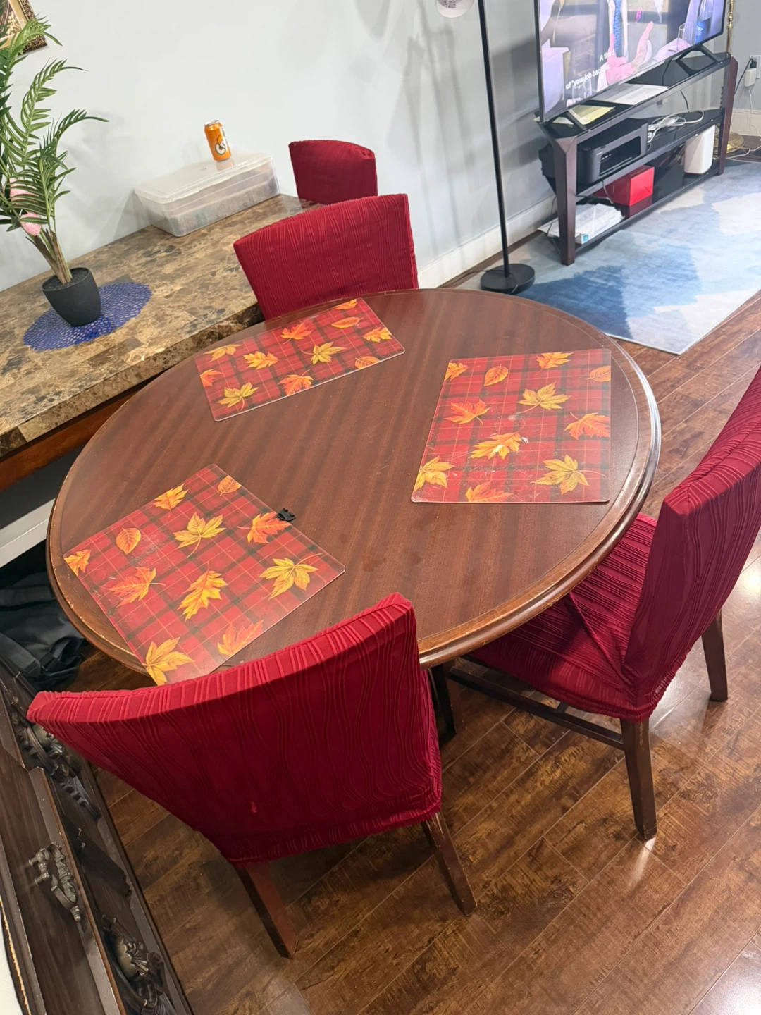 Round Dining Table with 4 Red Chairs