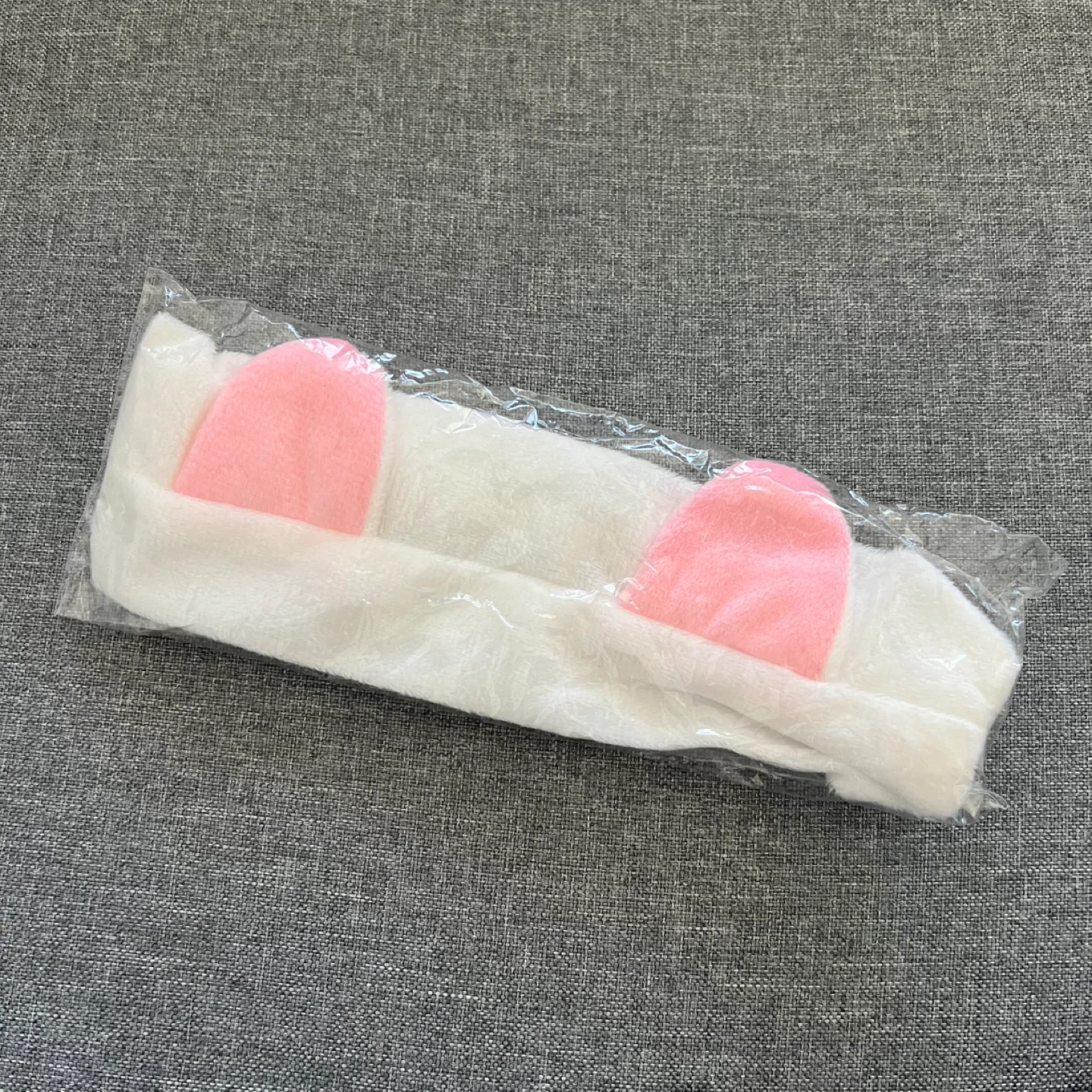 White headband for facials with pink bunny ears