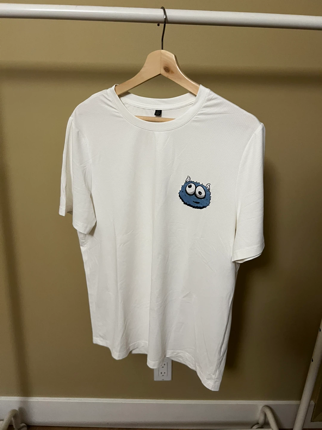 White T-Shirt with Blue Monster Graphic