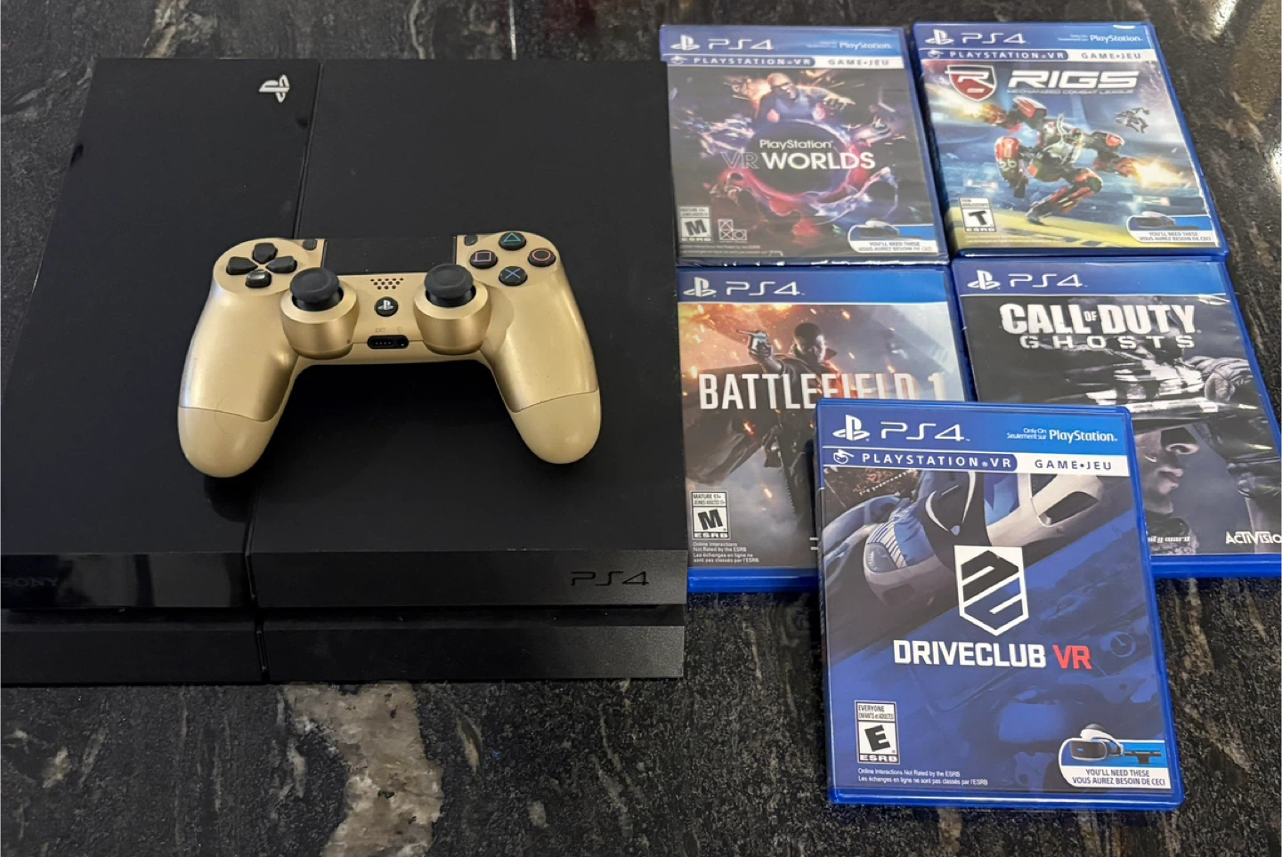 Sony PlayStation 4 Console with Gold Controller and Games