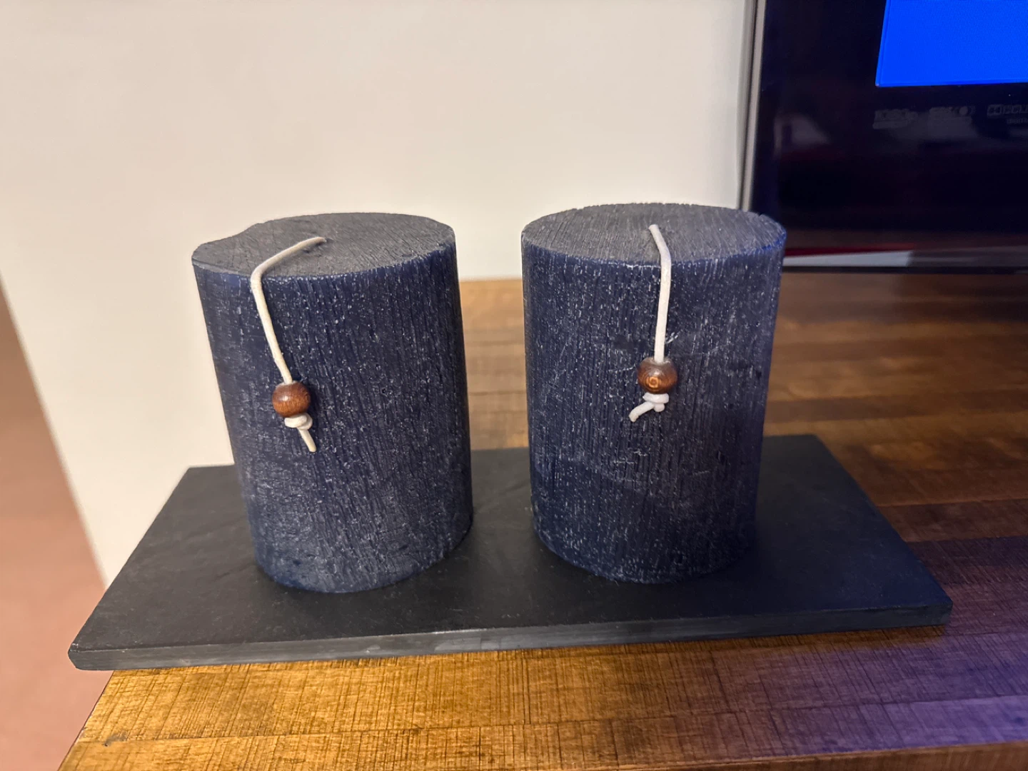 Two Large Dark Blue Pillar Candles