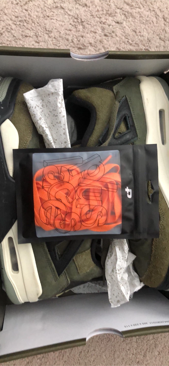 Air Jordan 4 "Undefeated" Olive Green Sneakers - photo 3