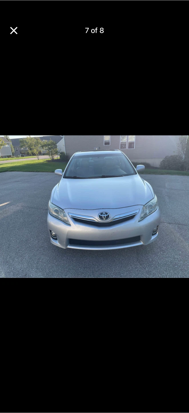 Silver Toyota Camry Hybrid Sedan