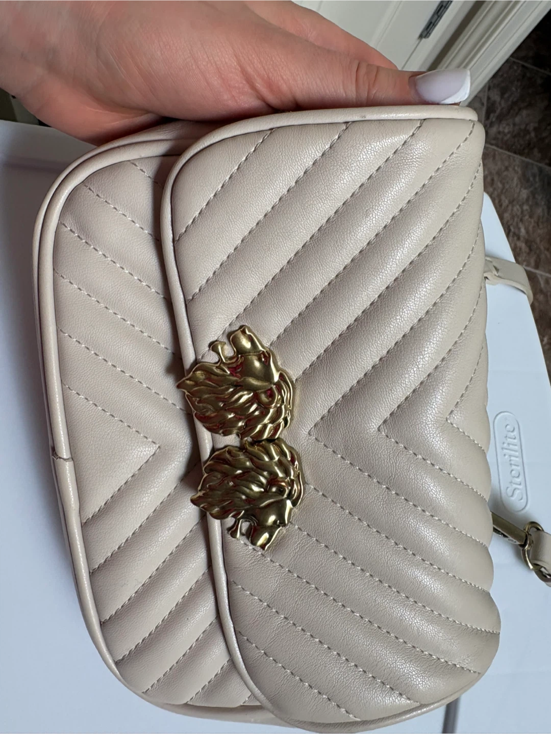 Quilted Cream Shoulder Bag with Lion Clasp