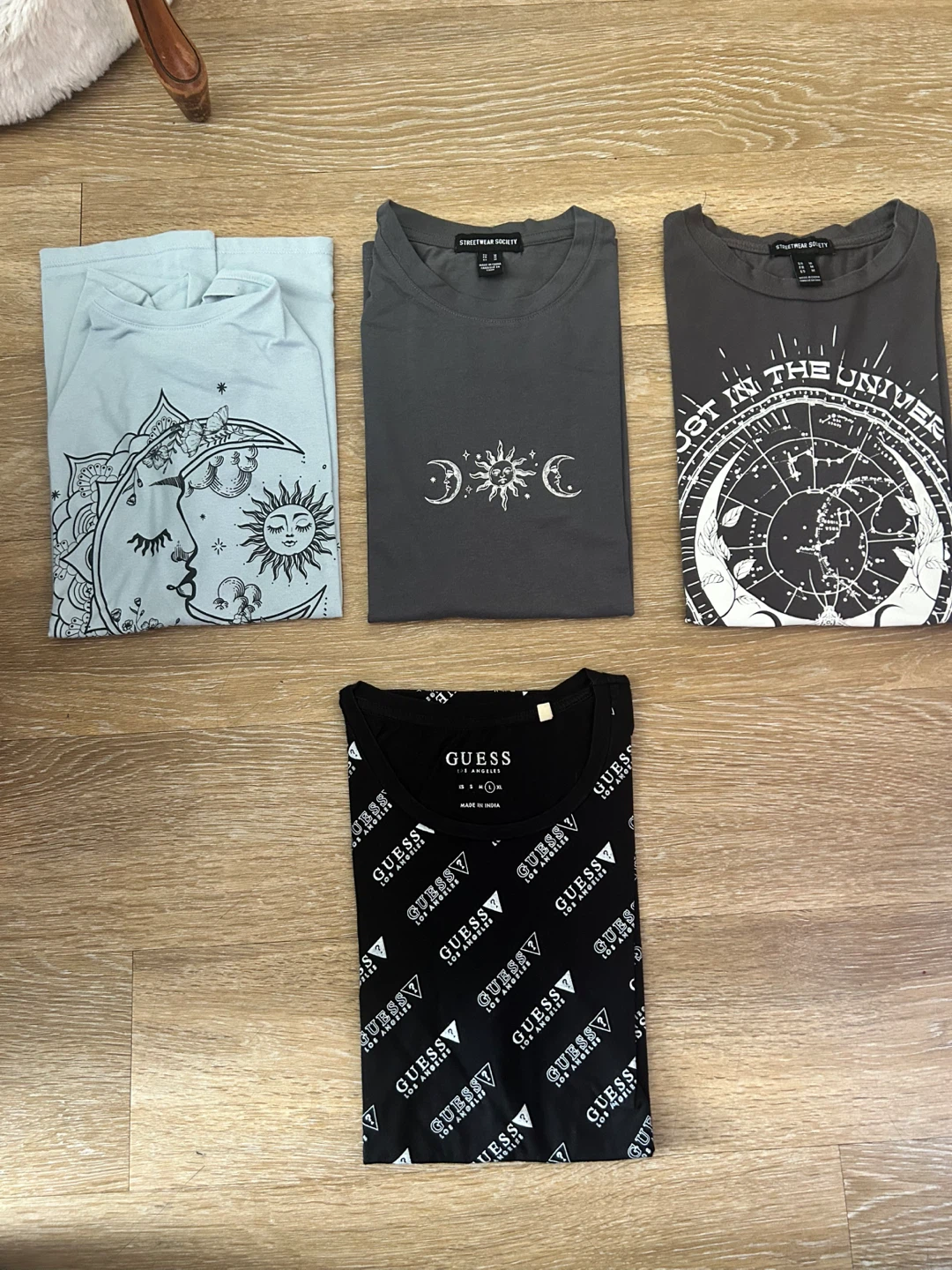 Bundle of 4 graphic t-shirts