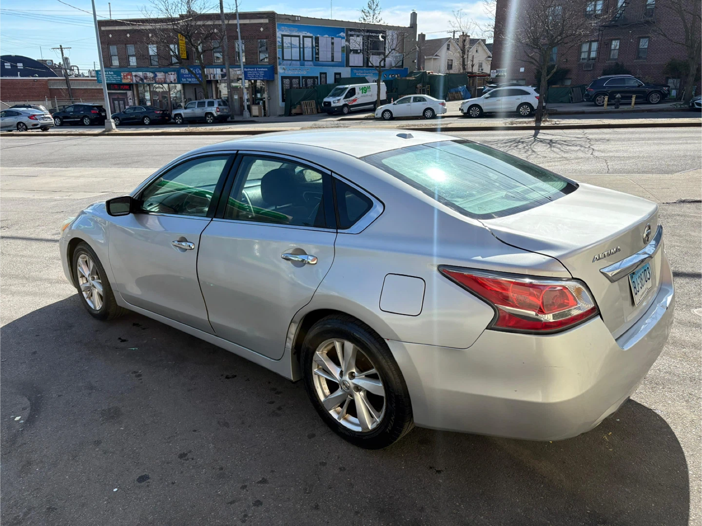 Silver Nissan Altima Sedan - photo 2